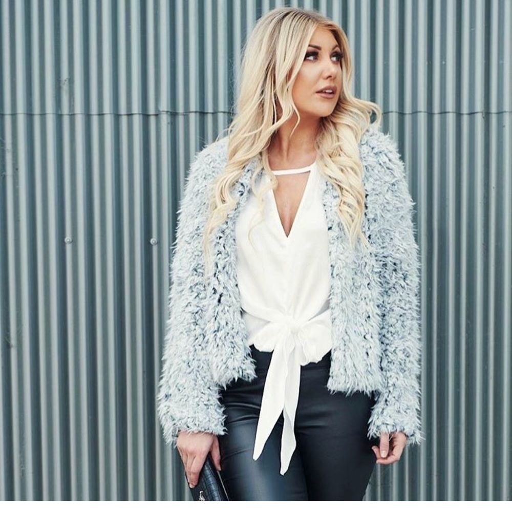 FUZZY POCKETED STATEMENT JACKET